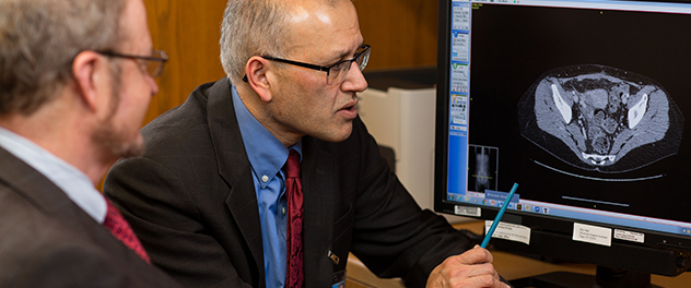 Dr. Yogish Kudva reviewing imaging with a colleague at Mayo Clinic in Rochester, Minnesota