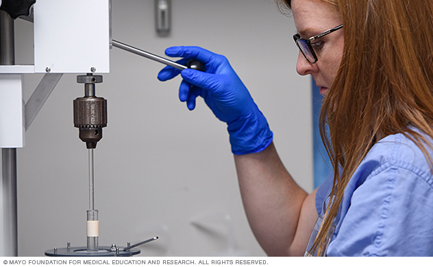 Trainee operating a sonicator