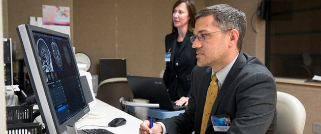 Todd J. Schwedt, M.D., and Catherine Chong, Ph.D., in the Department of Neurology at Mayo Clinic focusing on pain and headache research.