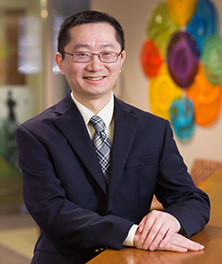 Head and shoulders photograph of Zhen Wang, Ph.D.