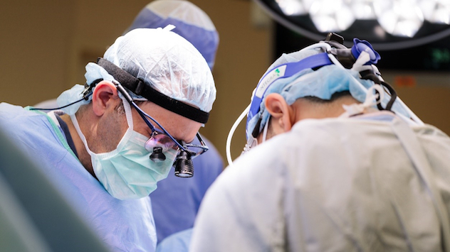 Surgeon using loupe in operating room