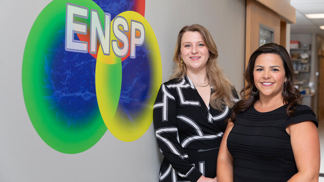 Portrait of two lab members in front of 