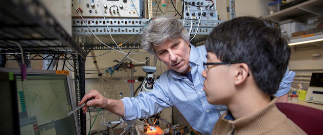 Michael F. Romero, Ph.D., working with a colleague in his Transporter Biology and Physiology Lab at Mayo Clinic