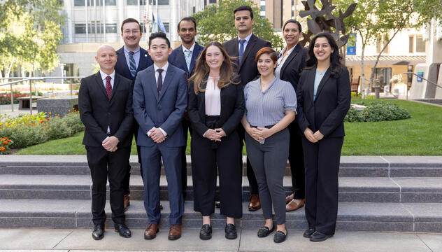 Nine research fellows standing together outside who are members of the 2024-2025 cohort of the Orthopedic Surgery Medical Student Research Gap Year Program