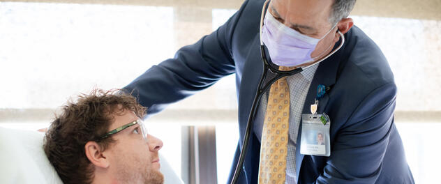 Two physicians seated in a conversation